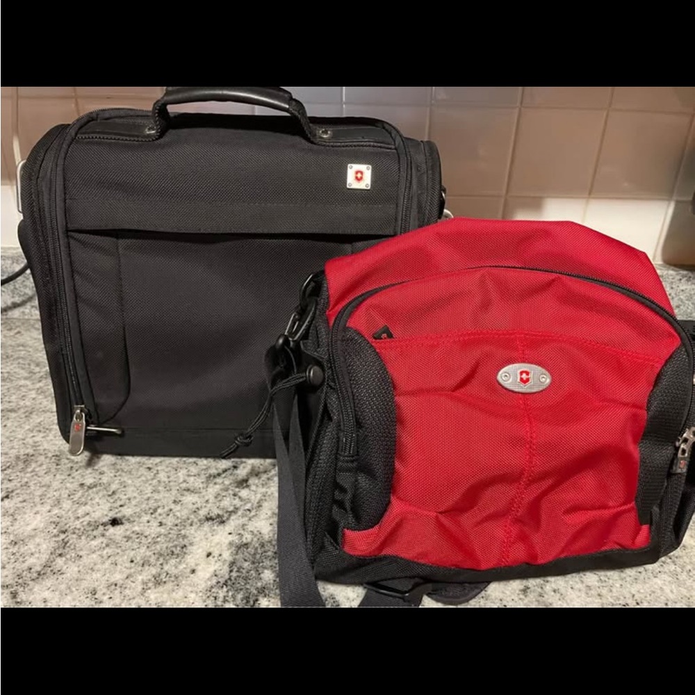 Victorinox Black and Red Swiss Army travel and messenger bags. Used once.